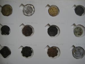 Storage tray for tokens in the collection (created 2013).